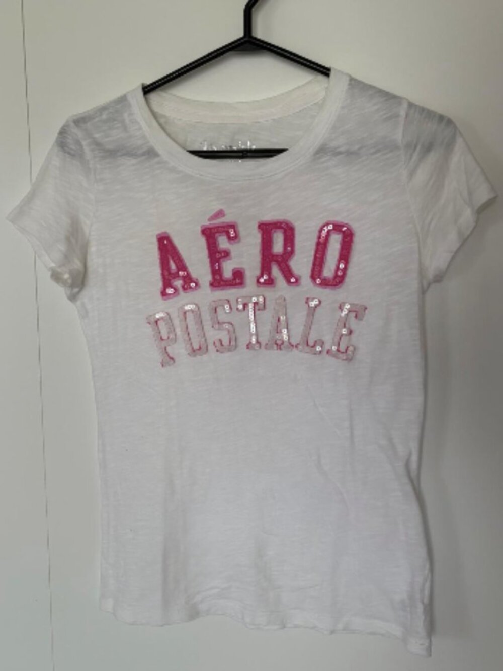 White Cap-sleeved T-shirt from Aeropostale with Pink AERO Sequence Decal